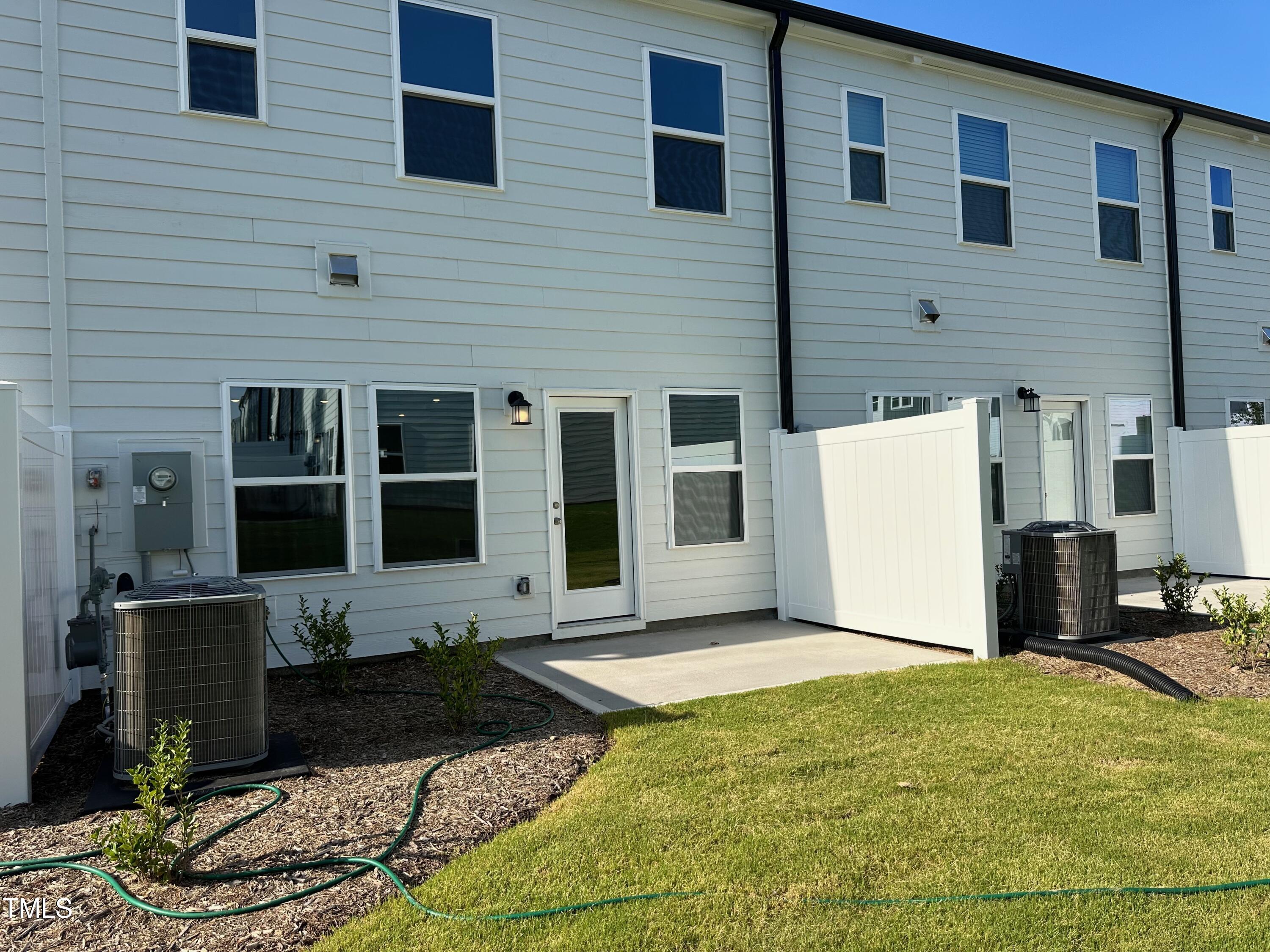 3008 Vitner Drive Durham, NC 27704 - Photo 16 of 17 a view of a house with backyard