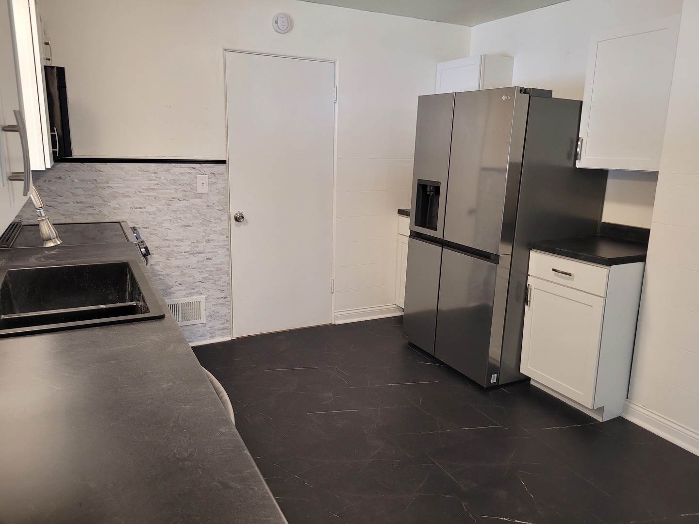 507 North 12th Street Mount Vernon, IL 62864 - Photo 11 of 23 a kitchen with a refrigerator and a stove