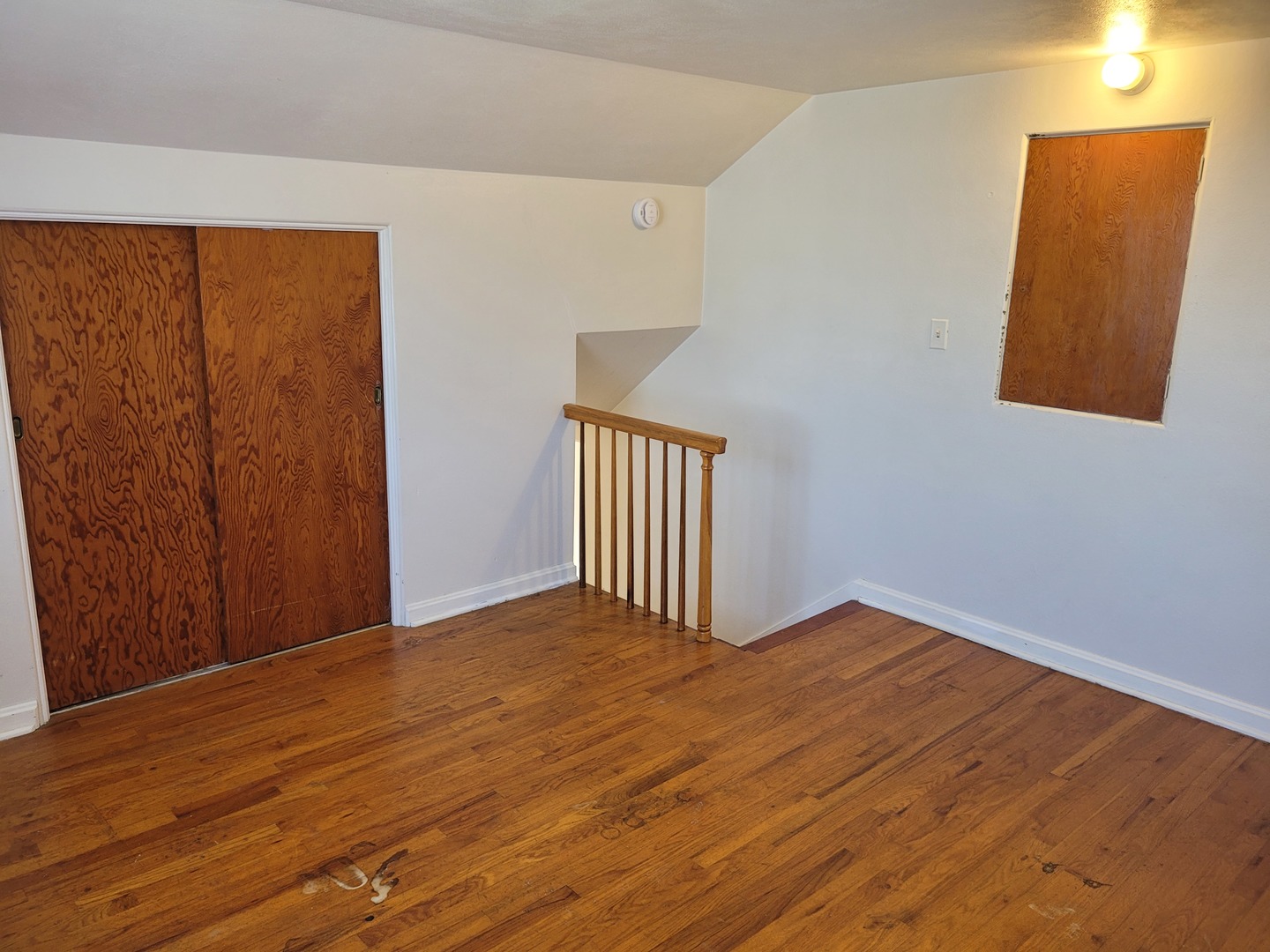 507 North 12th Street Mount Vernon, IL 62864 - Photo 22 of 23 a view of an empty room with wooden floor and a window
