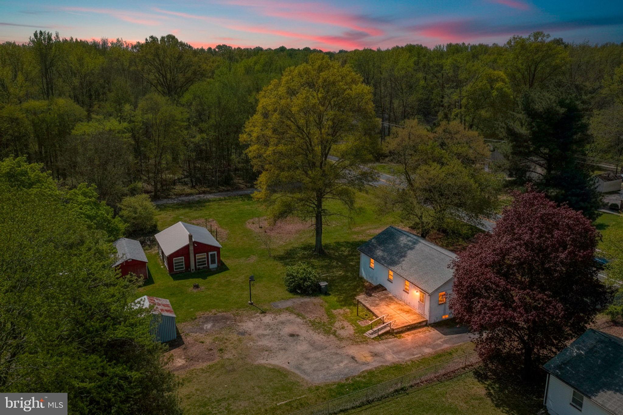 an aerial view of a house with mountain view