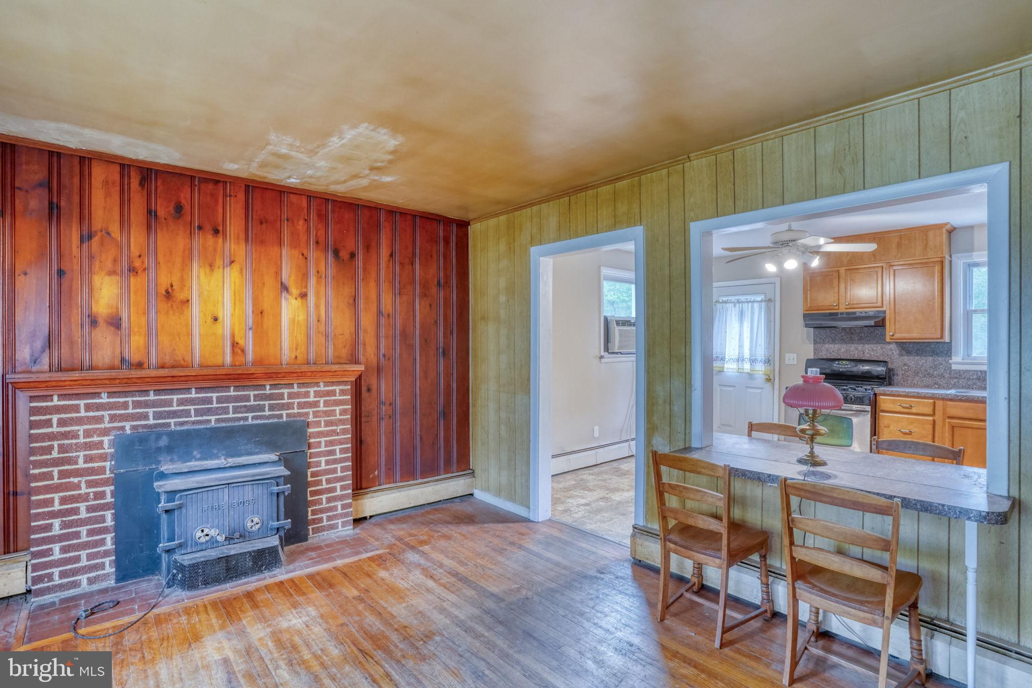 2927 Frazer Road Newark, DE 19702 - Photo 22 of 43 a living room with furniture and a fireplace
