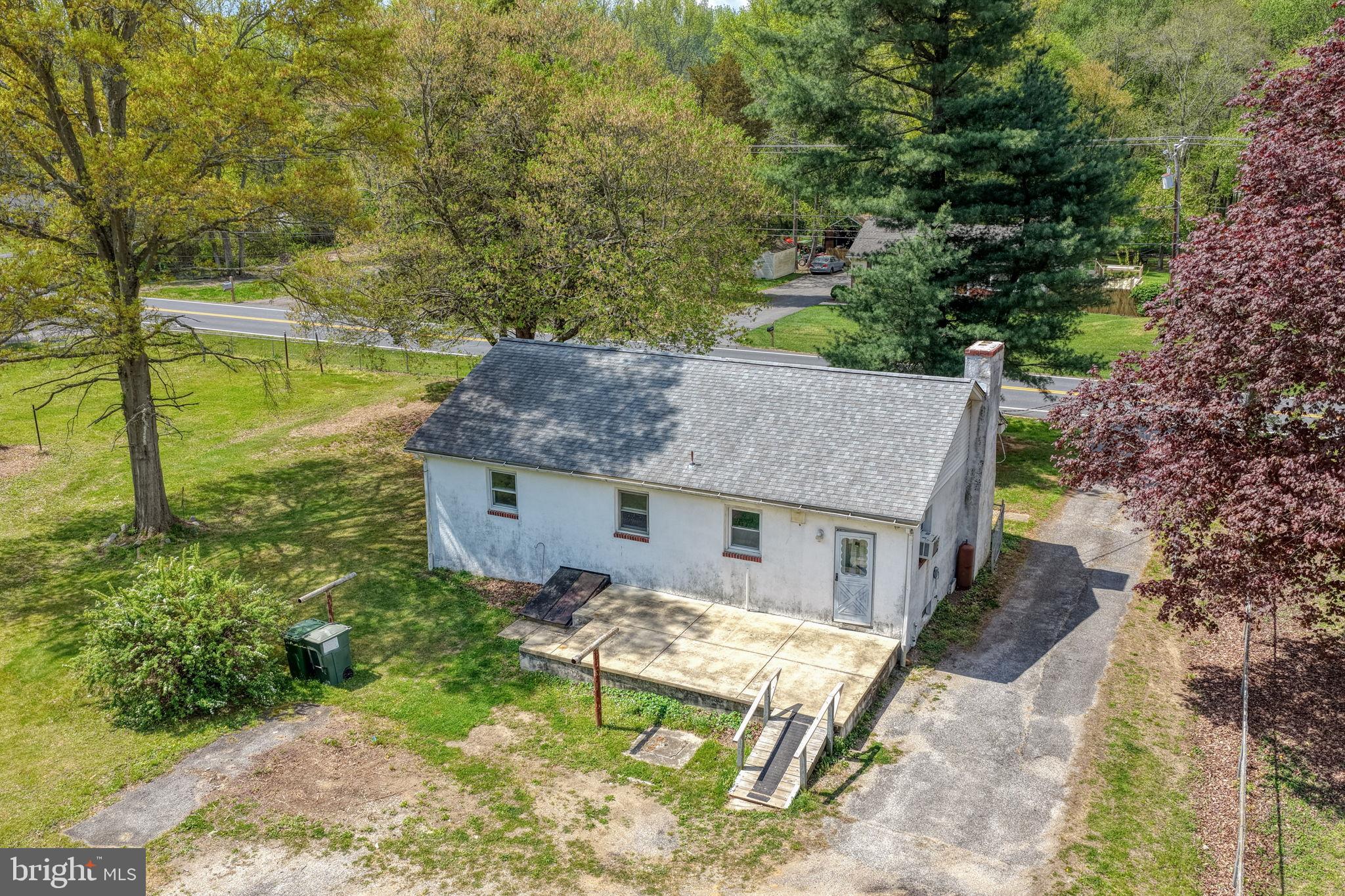 2927 Frazer Road Newark, DE 19702 - Photo 4 of 43 an aerial view of a house with swimming pool and garden