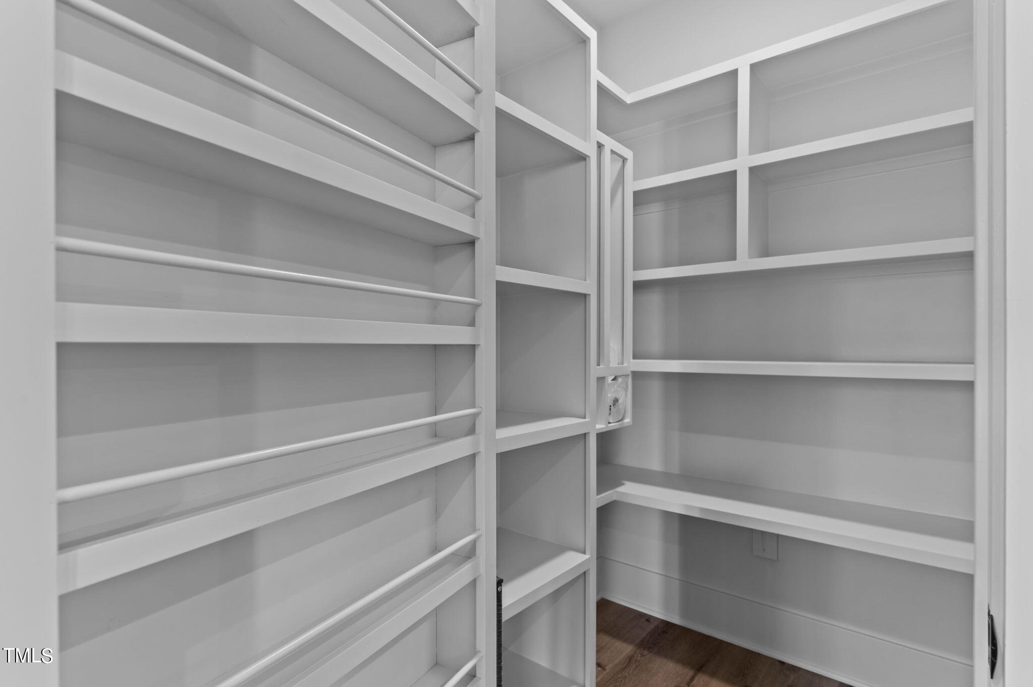 3816 Old Milburnie Road Raleigh, NC 27616 - Photo 20 of 58 a view of walk in closet with empty racks