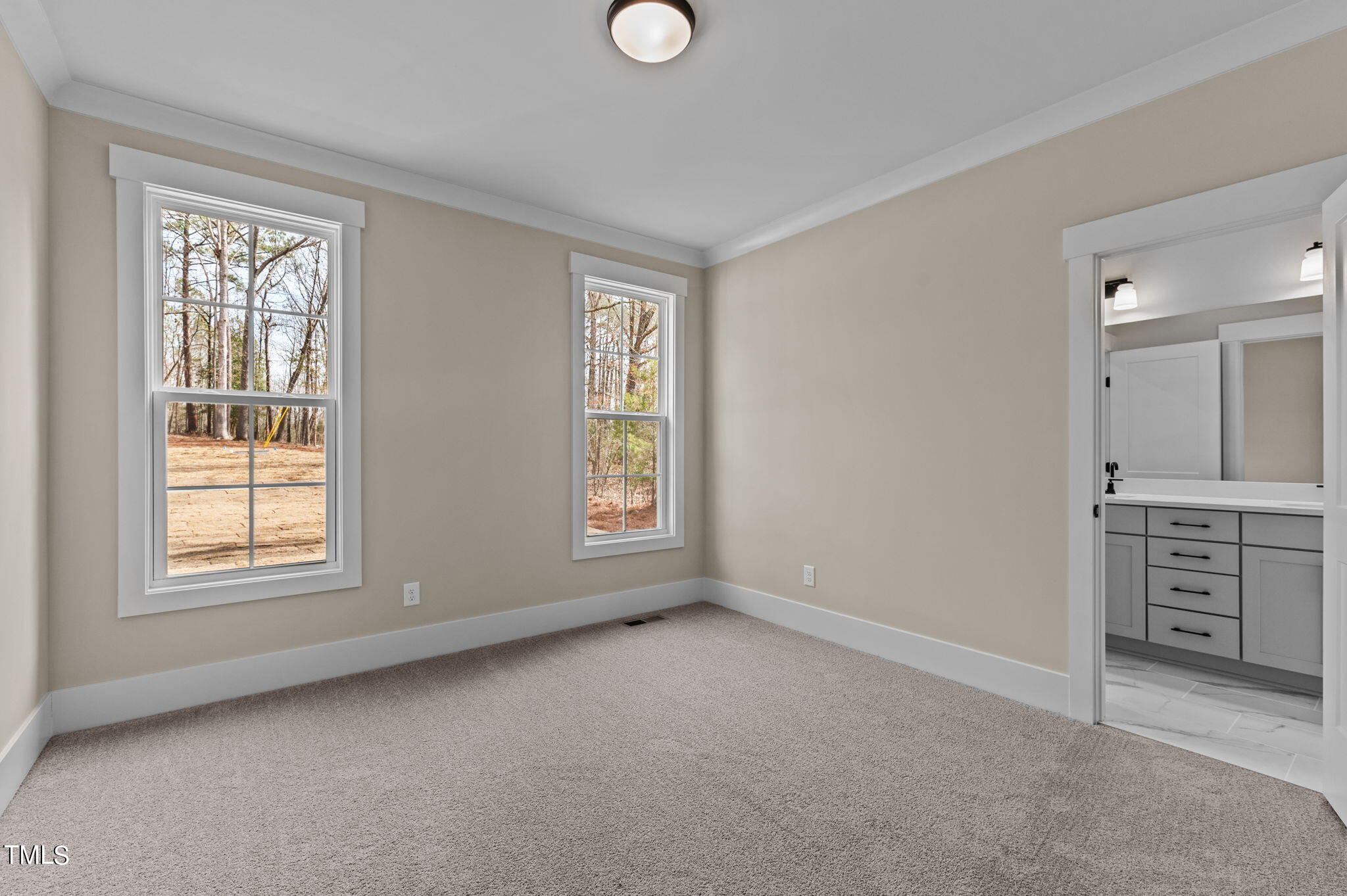 3816 Old Milburnie Road Raleigh, NC 27616 - Photo 21 of 58 an empty room with windows and closet