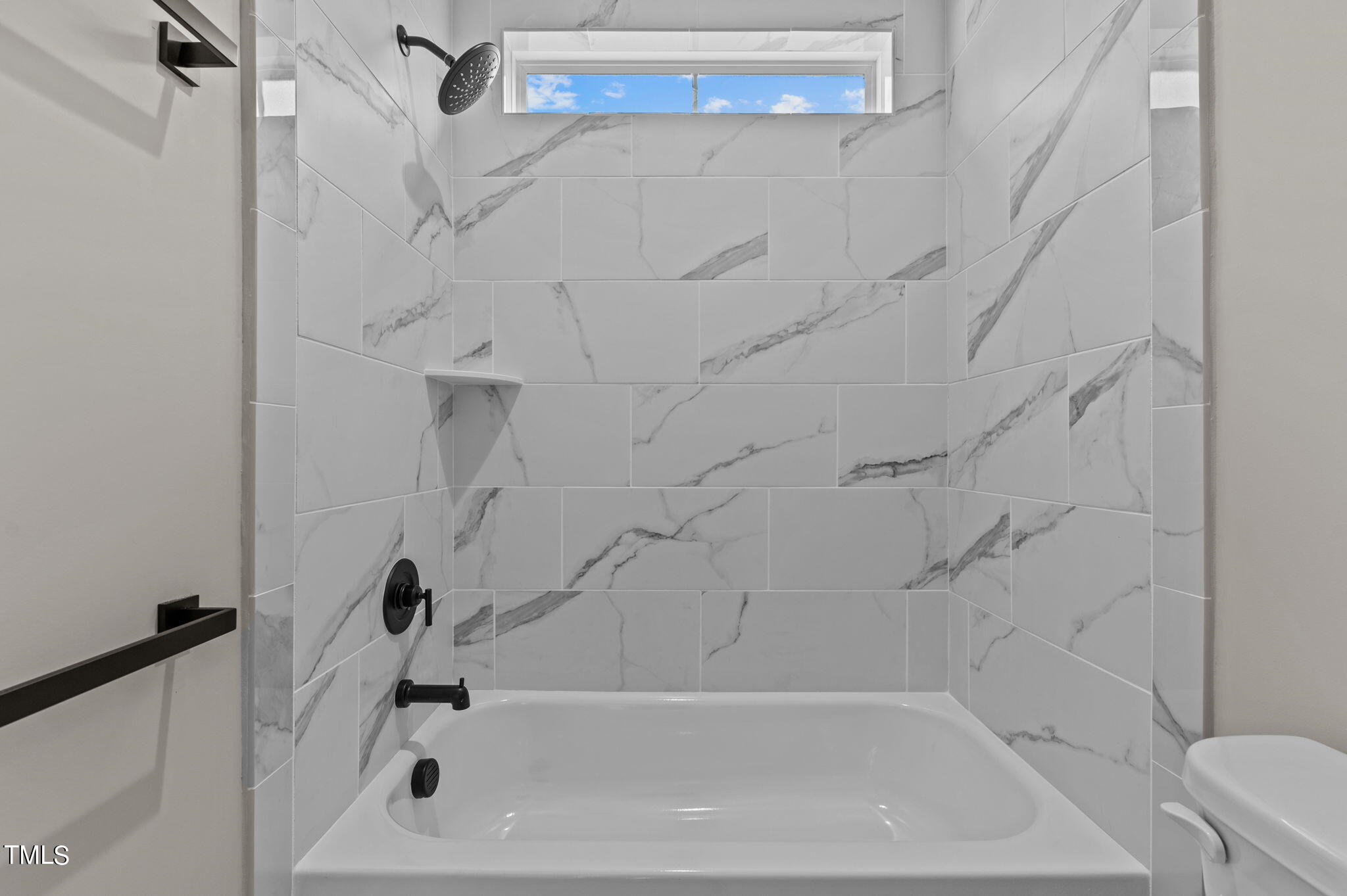 3816 Old Milburnie Road Raleigh, NC 27616 - Photo 24 of 58 a bathroom with a bathtub