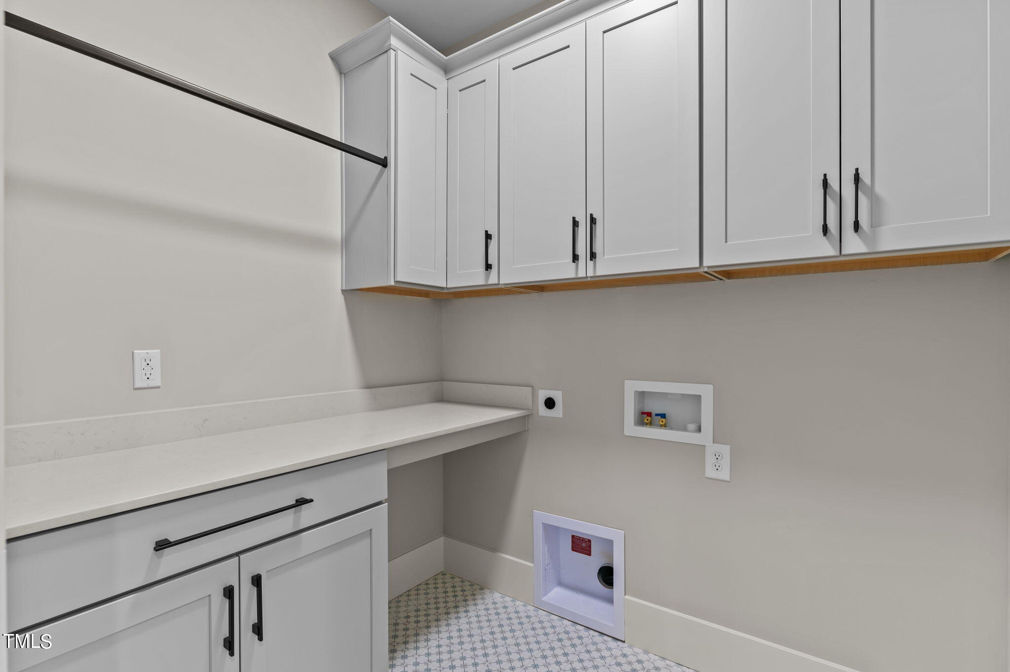 3816 Old Milburnie Road Raleigh, NC 27616 - Photo 31 of 58 a bathroom with a sink and cabinets