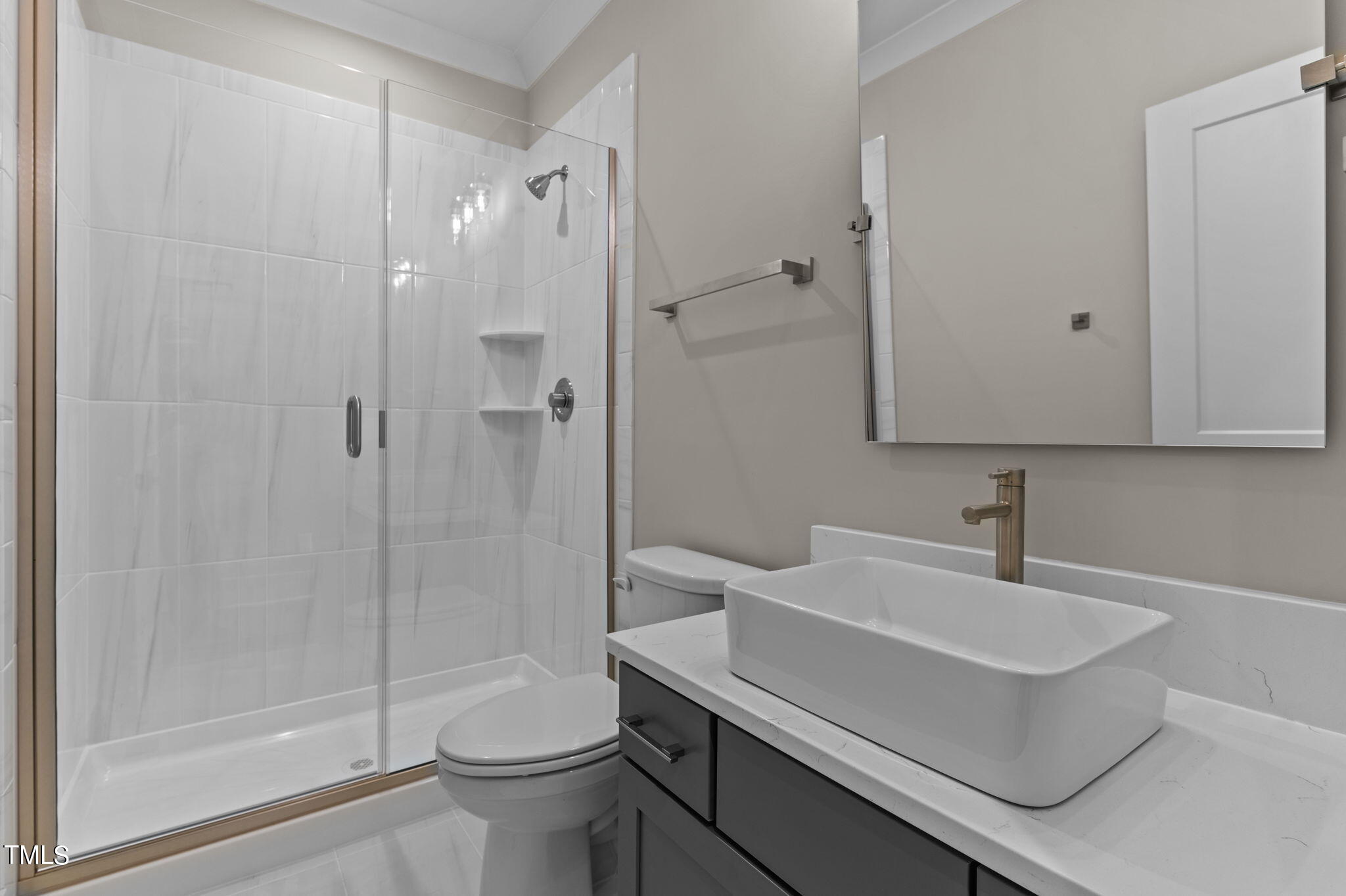 3816 Old Milburnie Road Raleigh, NC 27616 - Photo 33 of 58 a bathroom with a sink toilet and shower