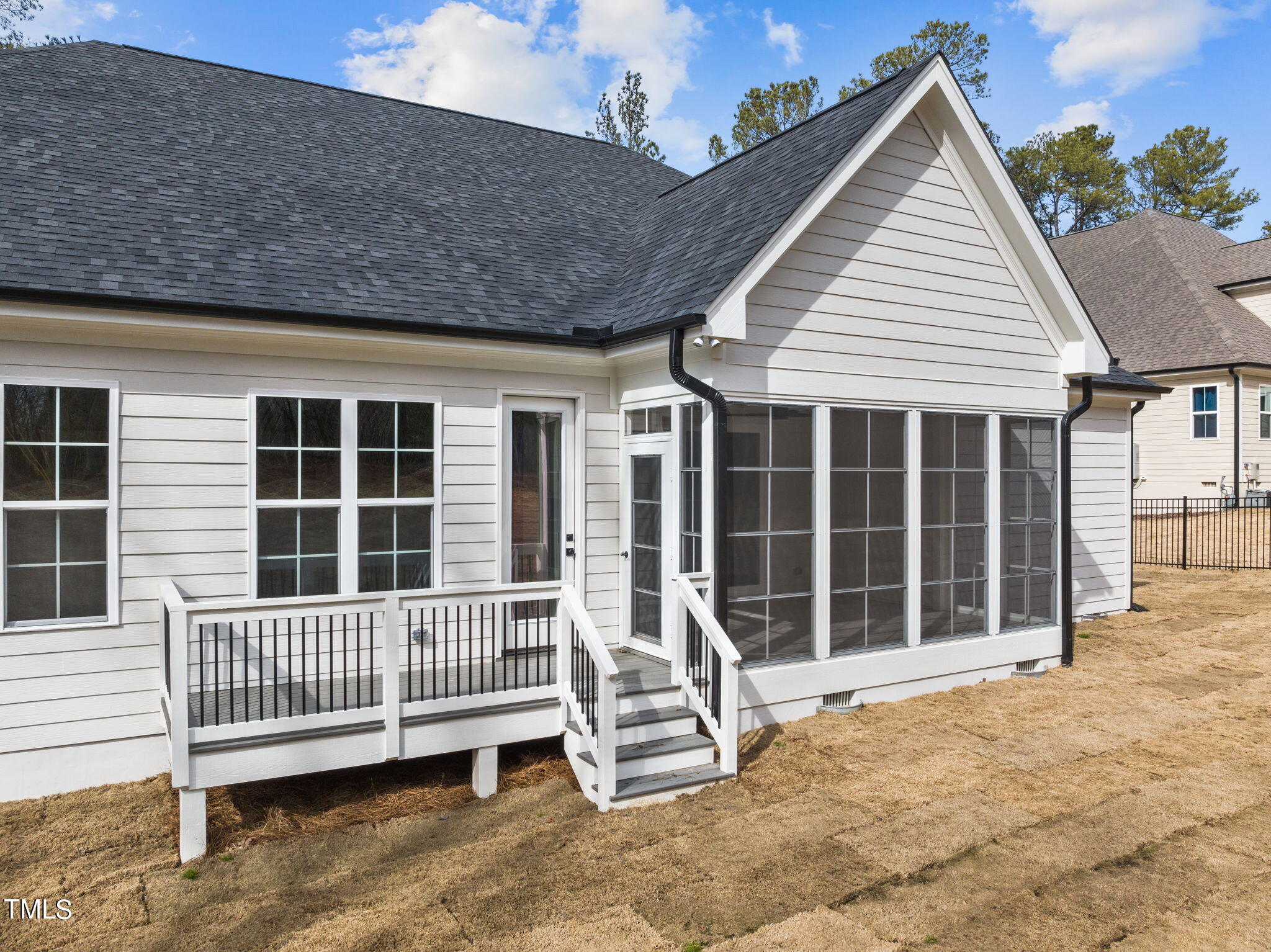 3816 Old Milburnie Road Raleigh, NC 27616 - Photo 51 of 58 a porch with a chair in front of house