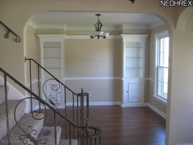 21443 Eaton Road Cleveland, OH 44126 - Photo 2 of 19 Pictured is the formal dining room and stairs leading to three bedrooms and full remodeled bathroom.