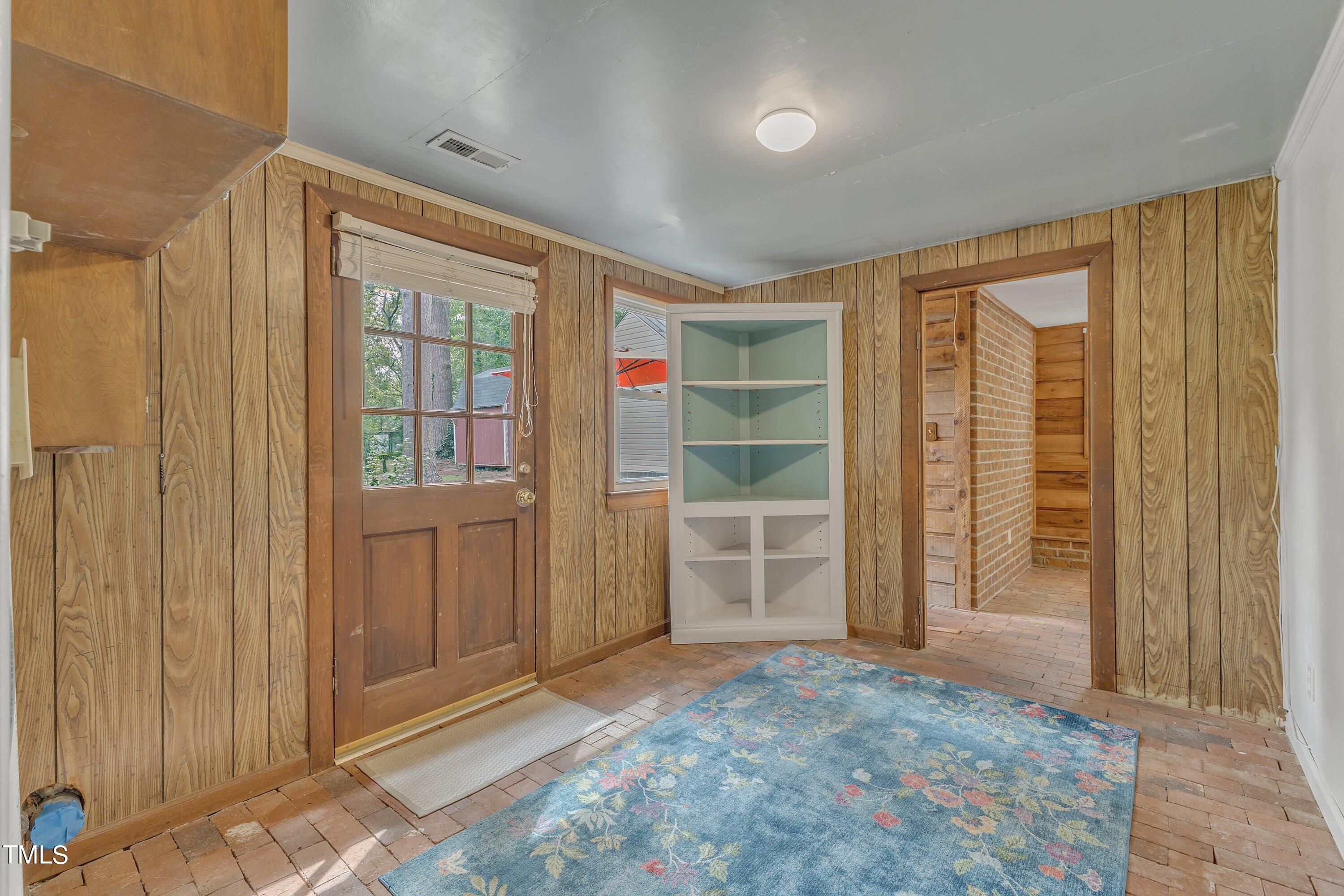 913 Ranch Farm Road Raleigh, NC 27603 - Photo 11 of 19 wooden floor and windows in an empty room