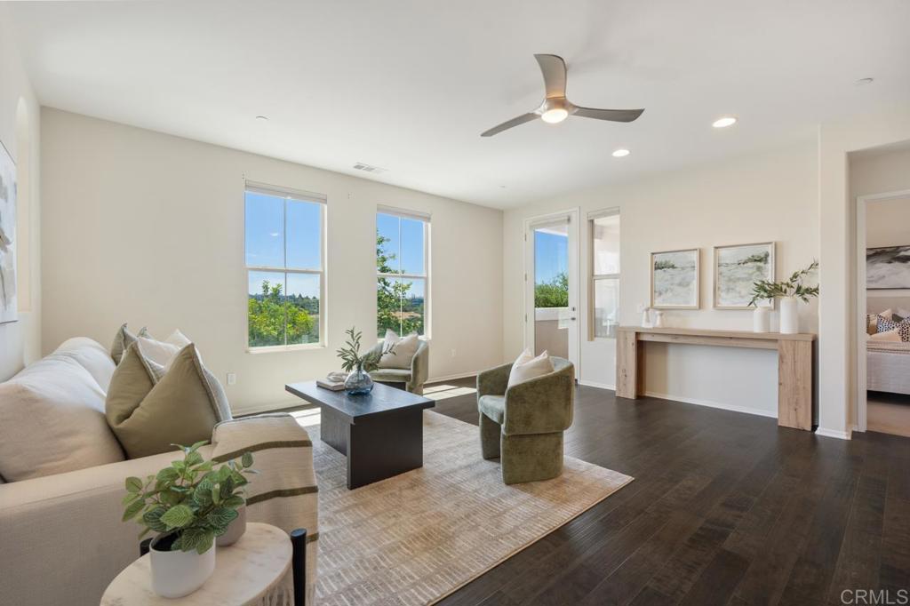 6610 Canopy Ridge Lane, Unit 37 San Diego, CA 92121 - Photo 11 of 65 a living room with furniture and window