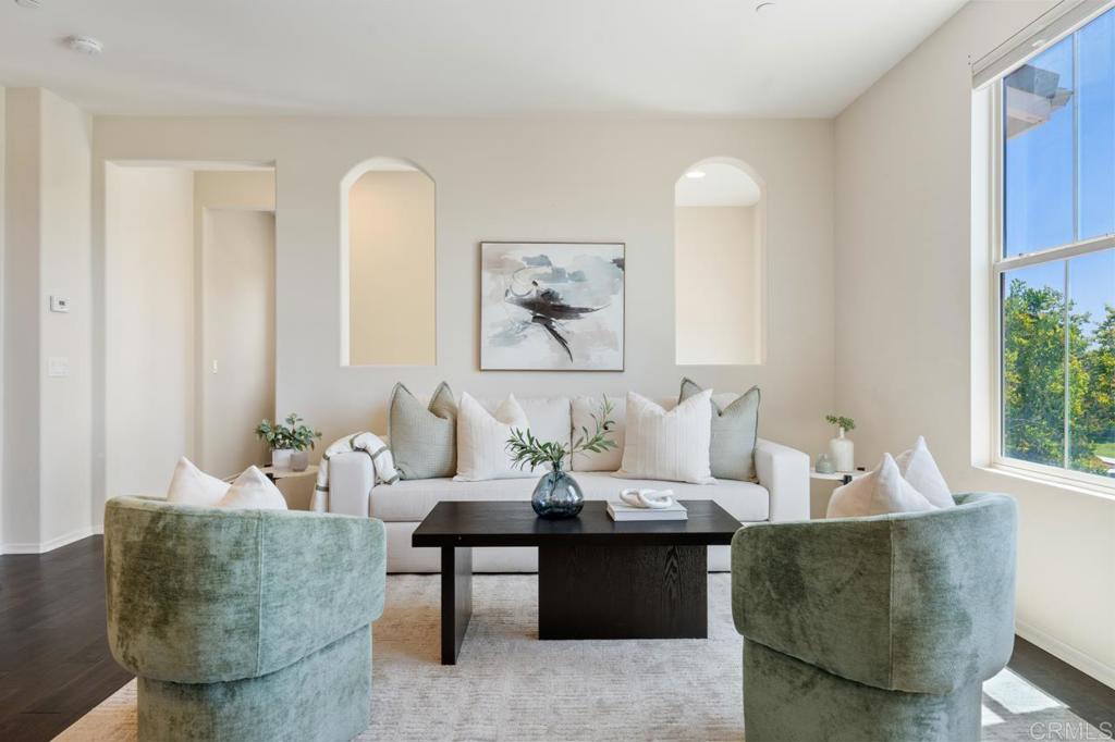6610 Canopy Ridge Lane, Unit 37 San Diego, CA 92121 - Photo 14 of 65 a living room with furniture and a large window