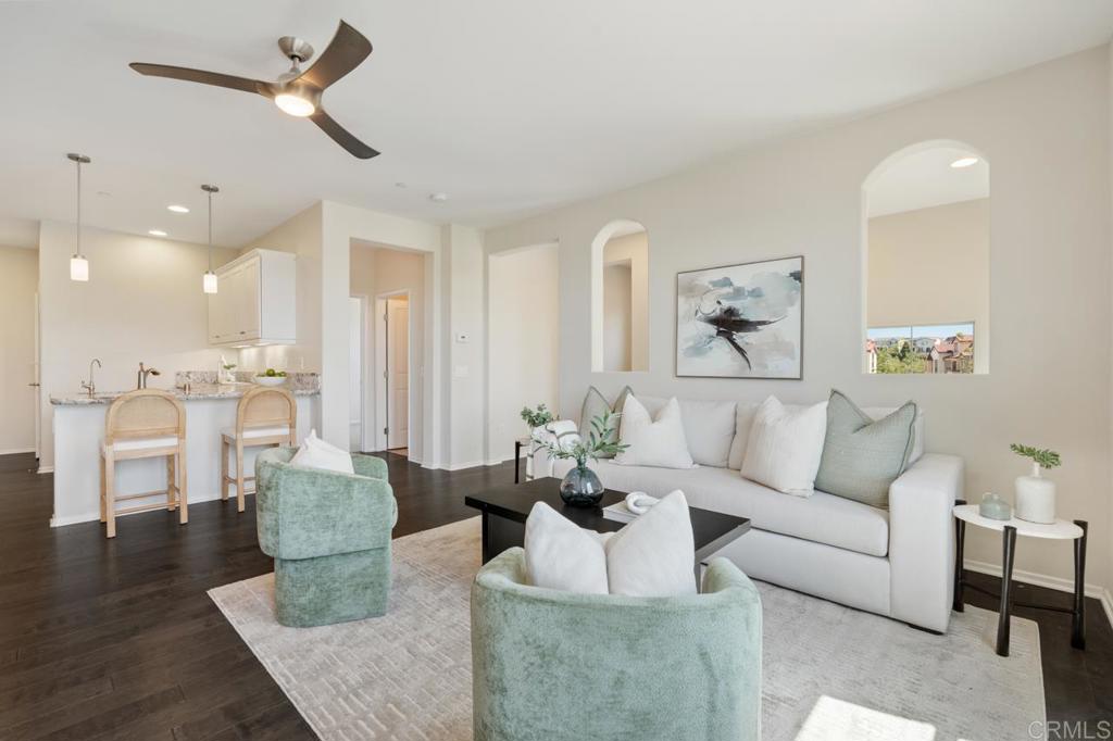 6610 Canopy Ridge Lane, Unit 37 San Diego, CA 92121 - Photo 15 of 65 a living room with furniture or outdoor view and a dining table
