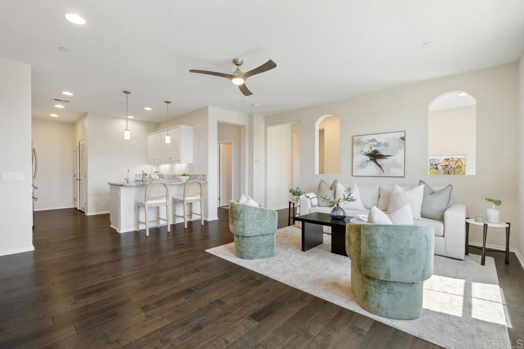 6610 Canopy Ridge Lane, Unit 37 San Diego, CA 92121 - Photo 17 of 65 a living room with furniture and wooden floor