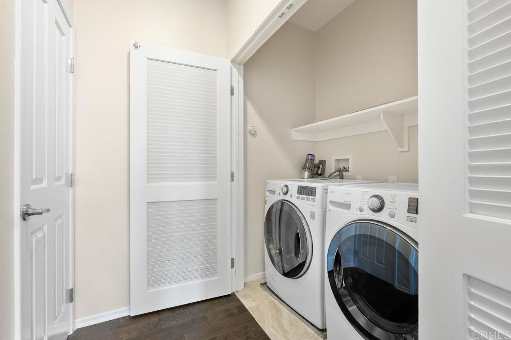 6610 Canopy Ridge Lane, Unit 37 San Diego, CA 92121 - Photo 30 of 65 a view of hallway with washer and dryer