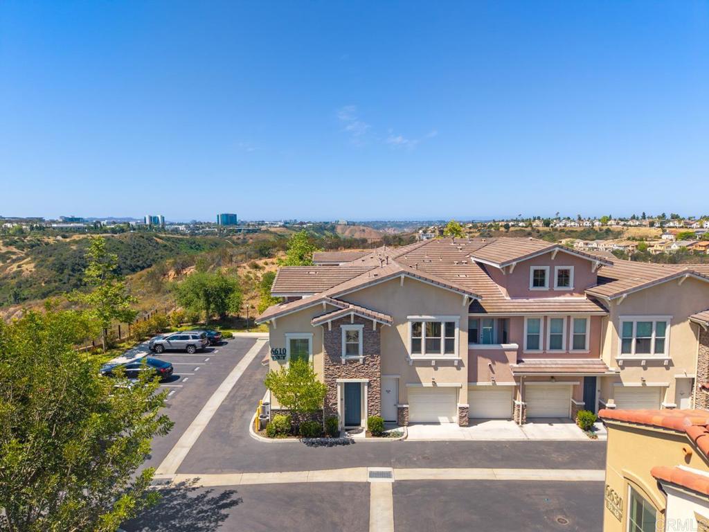 6610 Canopy Ridge Lane, Unit 37 San Diego, CA 92121 - Photo 3 of 65 an aerial view of a house with a ocean view