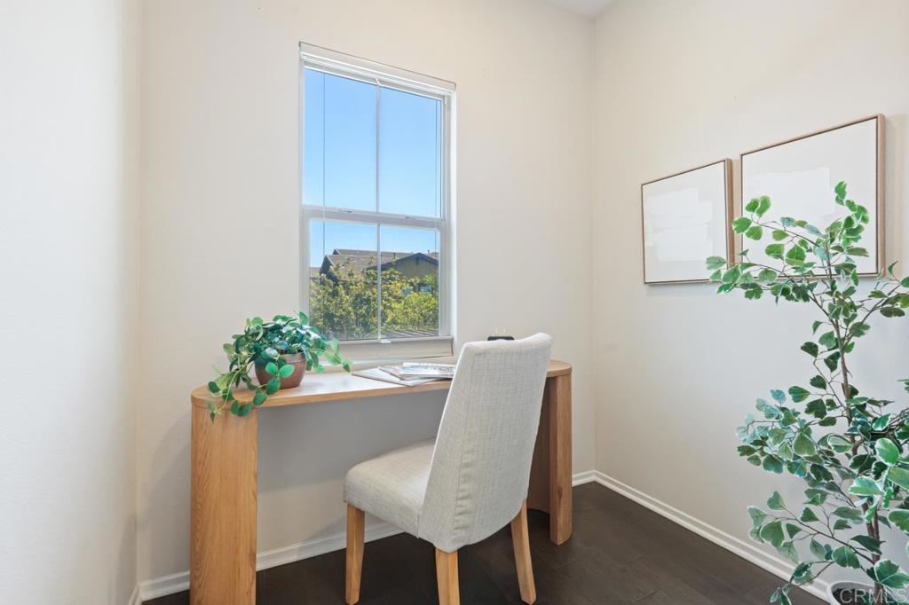 6610 Canopy Ridge Lane, Unit 37 San Diego, CA 92121 - Photo 39 of 65 a view of a workspace with furniture and a potted plant