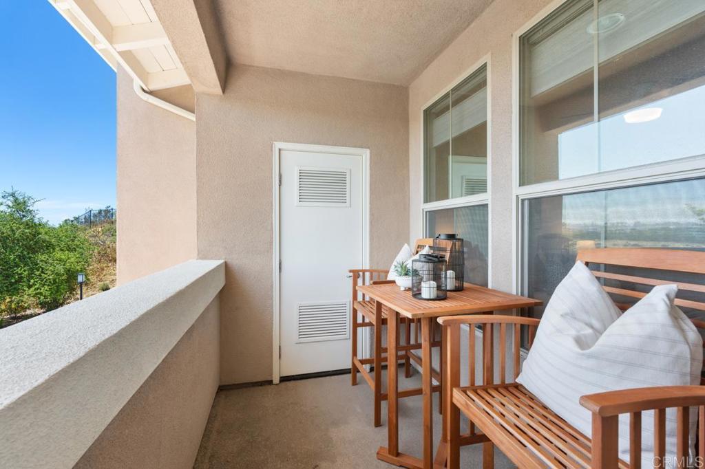 6610 Canopy Ridge Lane, Unit 37 San Diego, CA 92121 - Photo 46 of 65 a dining room with furniture and window