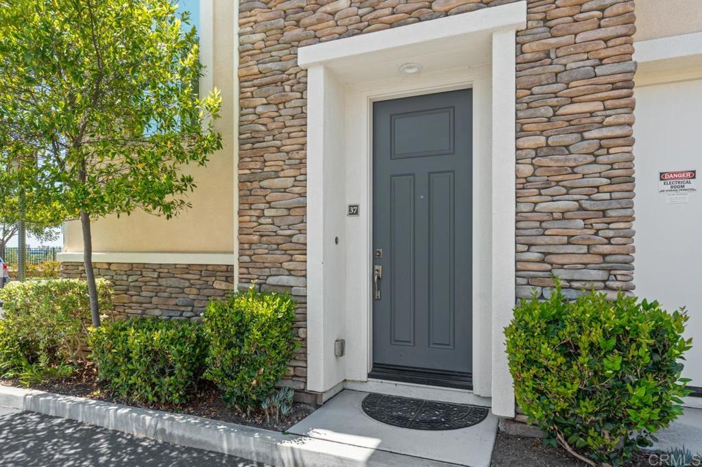 6610 Canopy Ridge Lane, Unit 37 San Diego, CA 92121 - Photo 6 of 65 a view of a door and a window