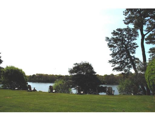 1343 Falmouth Road Barnstable, MA 02632 - Photo 4 of 4 a view of grassy field with mountain