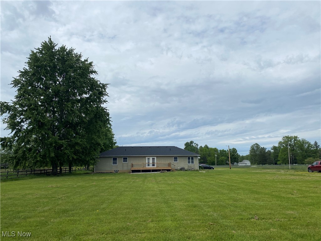36889 Capel Road Grafton, OH 44044 - Photo 22 of 26 View of yard featuring a deck