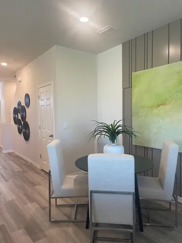 a view of a dining room with furniture