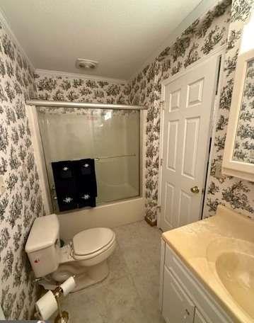 93 Rue Beauregard Lavonia, GA 30553 - Photo 14 of 26 a bathroom with a sink a toilet and shower