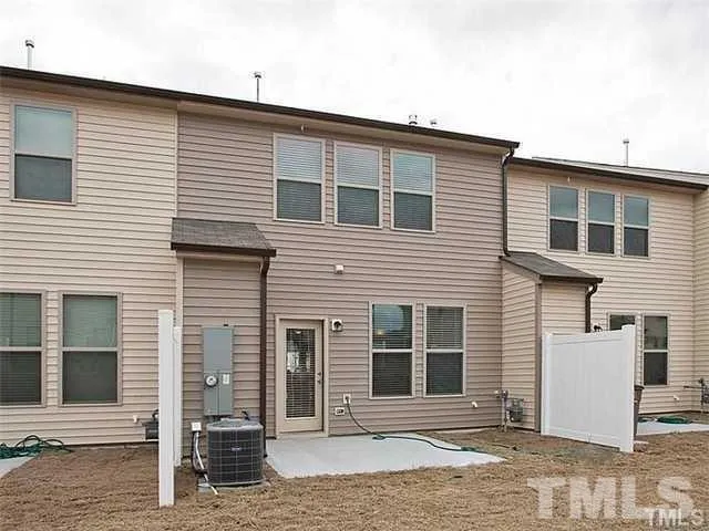 a front view of a house with a garage