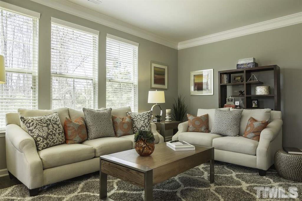 3713 Landshire View Lane Raleigh, NC 27616 - Photo 6 of 15 a living room with furniture and large windows