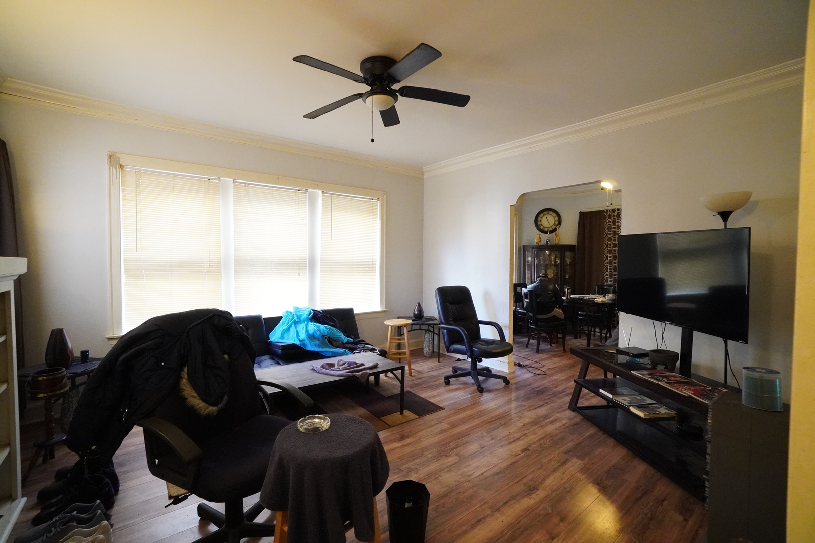 6419 South Morgan Street Chicago, IL 60621 - Photo 4 of 11 a living room with furniture and a flat screen tv