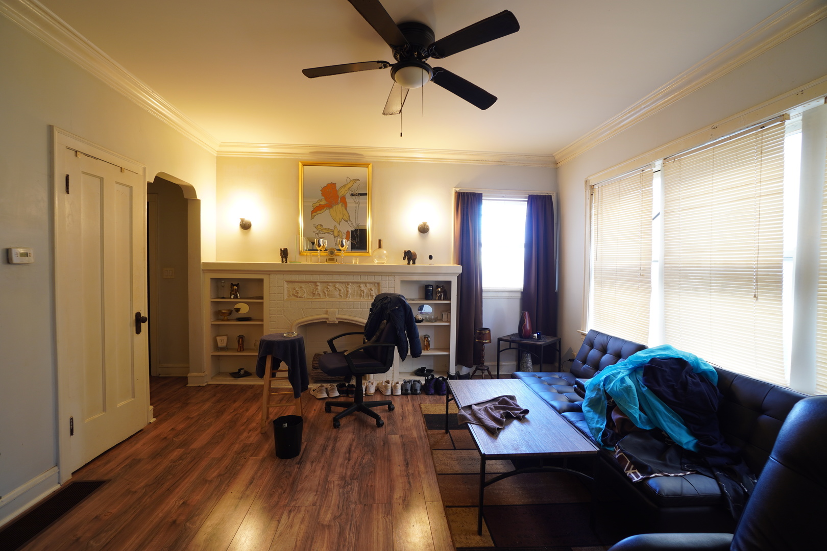 6419 South Morgan Street Chicago, IL 60621 - Photo 5 of 11 a view of a livingroom with furniture and a fireplace