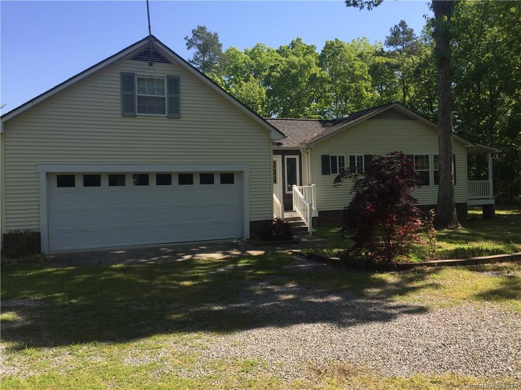 5825 Cress Road Concord, NC 28025 - Photo 3 of 23 a house view with a garden space