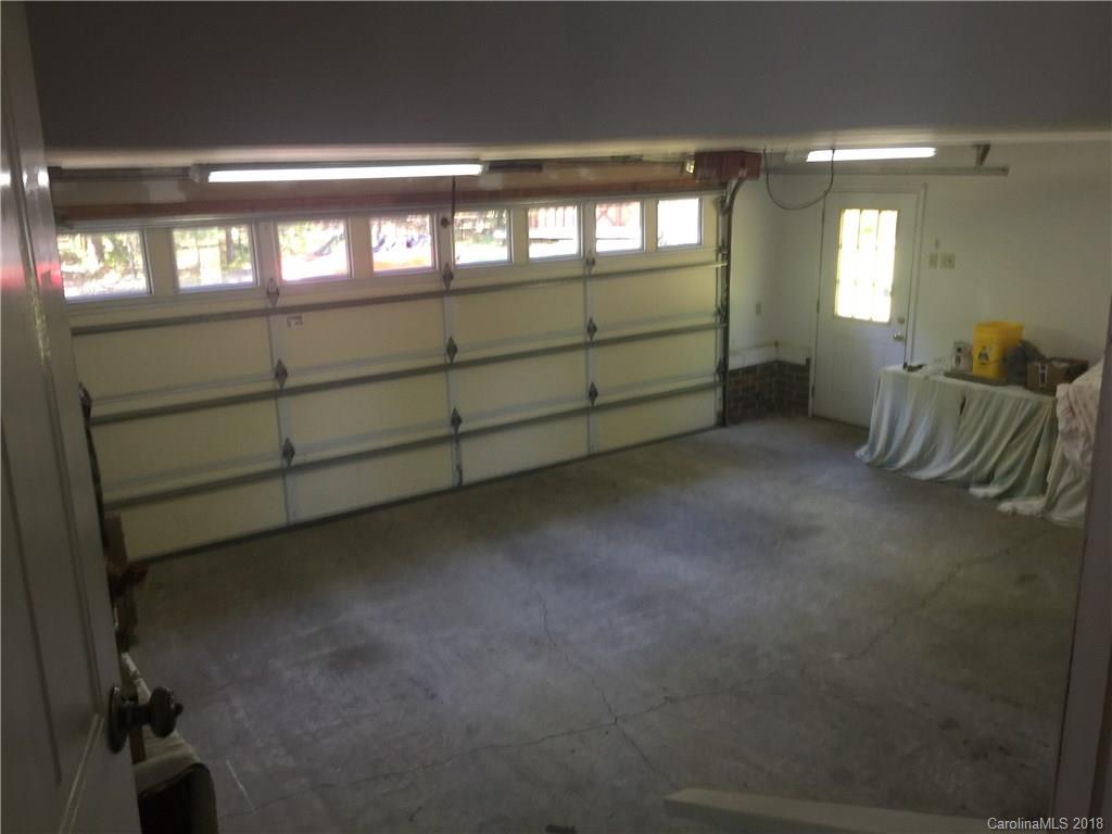 5825 Cress Road Concord, NC 28025 - Photo 22 of 23 a view of an empty room with windows