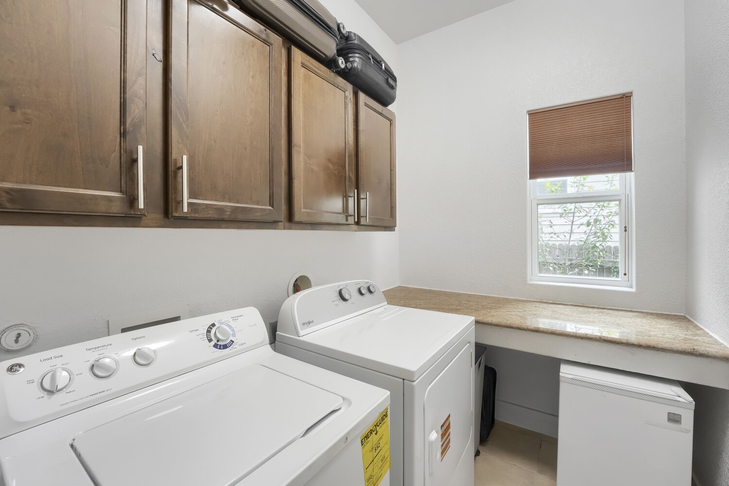 805 Waterfall Way Austin, TX 78753 - Photo 23 of 29 Laundry Room with extra storage and folding area