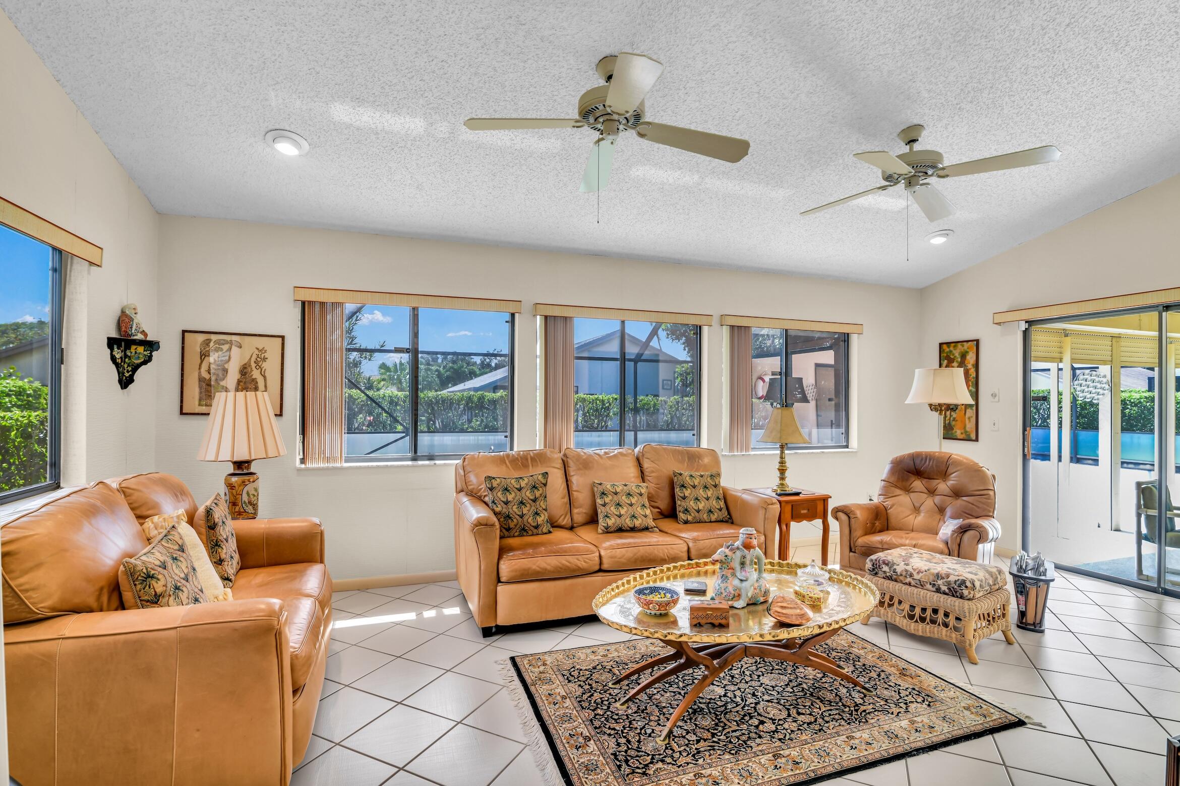 2660 Riviera Drive Delray Beach, FL 33445 - Photo 21 of 40 a living room with furniture and a window