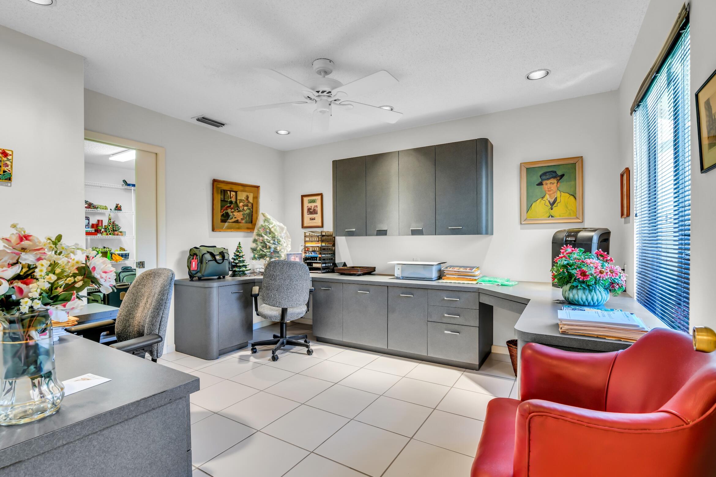 2660 Riviera Drive Delray Beach, FL 33445 - Photo 34 of 40 a room with furniture and flat screen tv