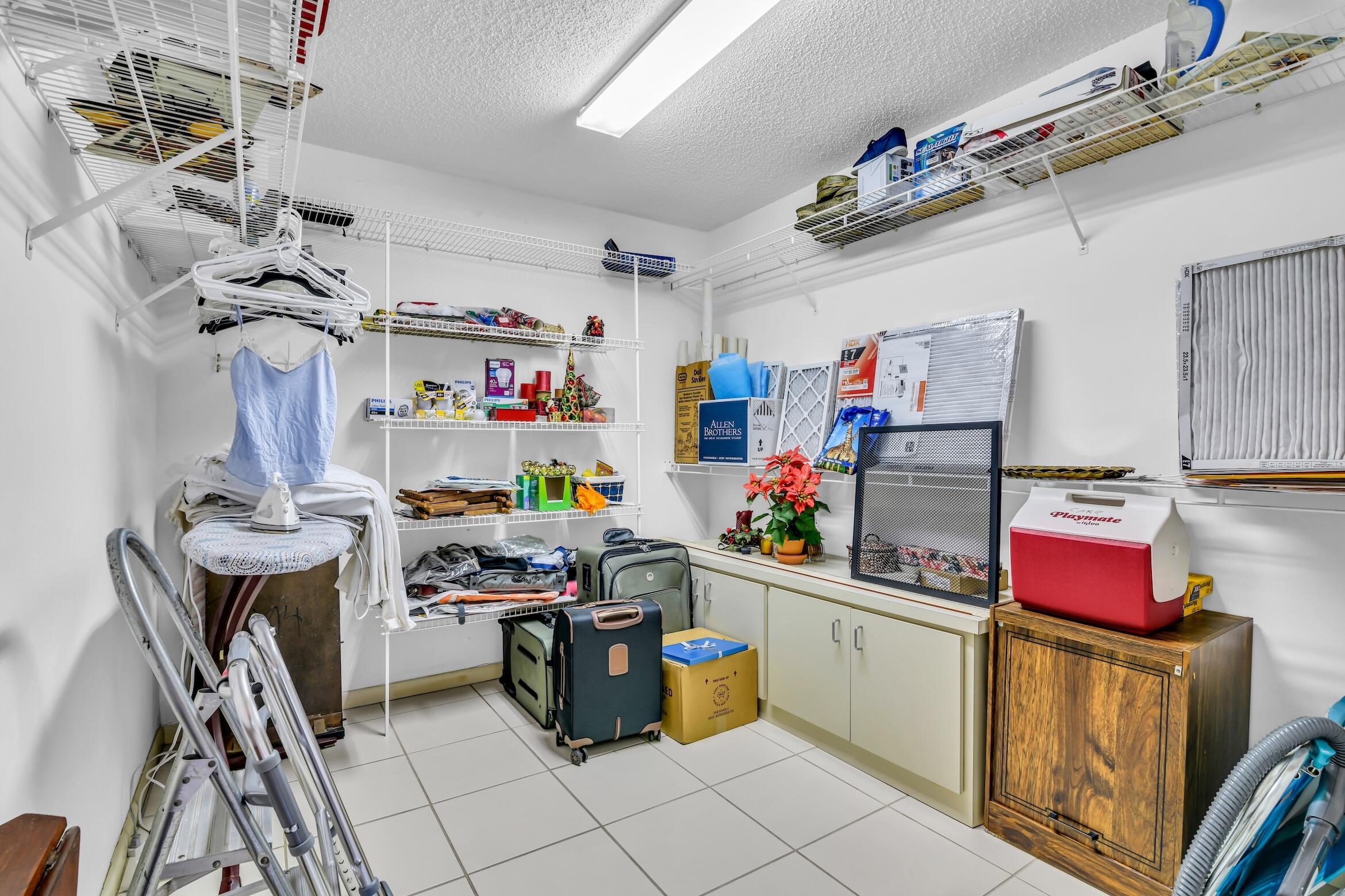 2660 Riviera Drive Delray Beach, FL 33445 - Photo 36 of 40 a room with storage and utility