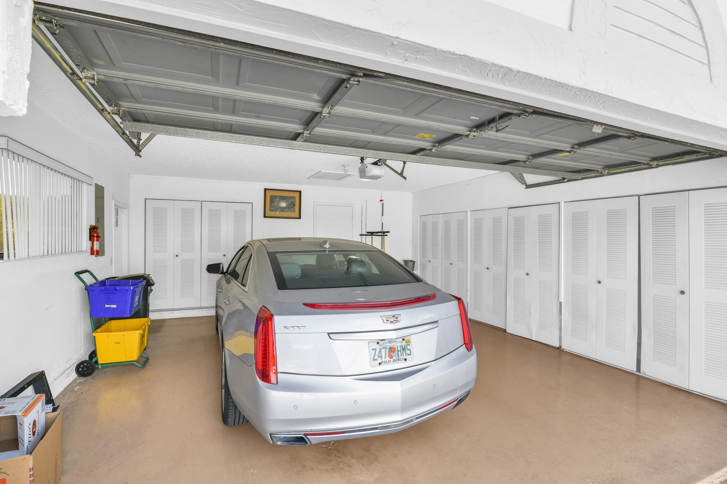 2660 Riviera Drive Delray Beach, FL 33445 - Photo 5 of 40 a car parked in garage