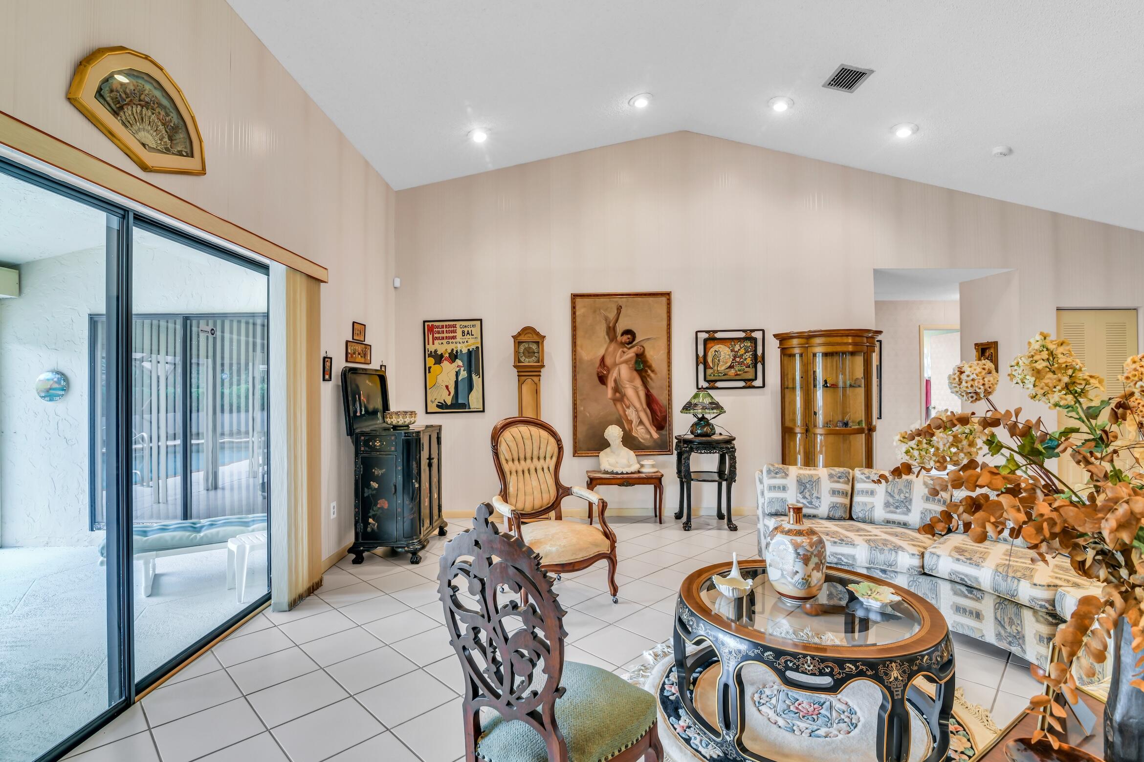 2660 Riviera Drive Delray Beach, FL 33445 - Photo 6 of 40 a living room with furniture and a window