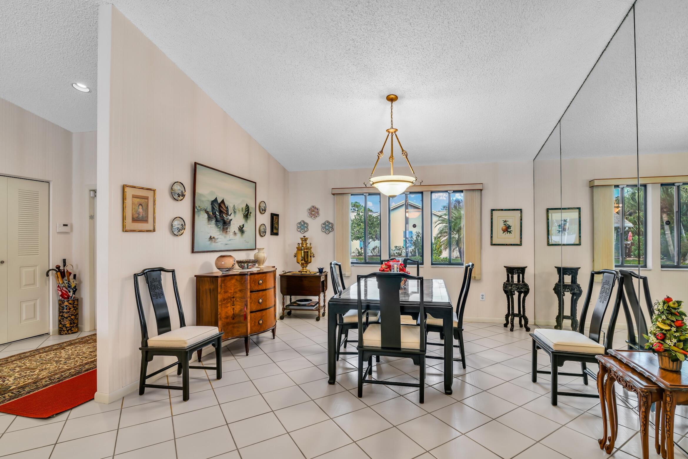 2660 Riviera Drive Delray Beach, FL 33445 - Photo 10 of 40 a view of a dining room with furniture