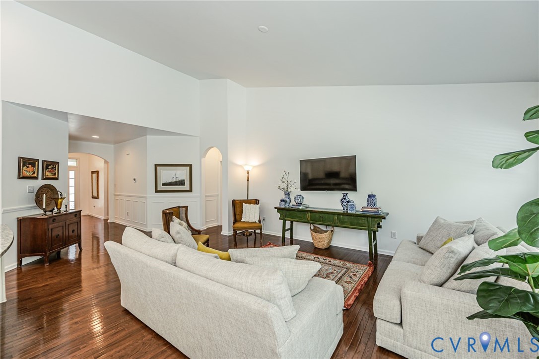 7435 Wicks Road Williamsburg, VA 23188 - Photo 18 of 82 Open-concept living area with lustrous wood-finish