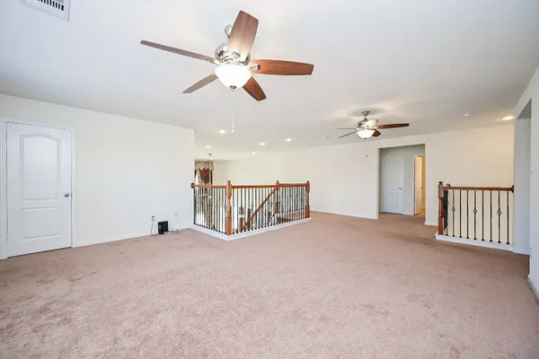 a view of a room that has a window in it