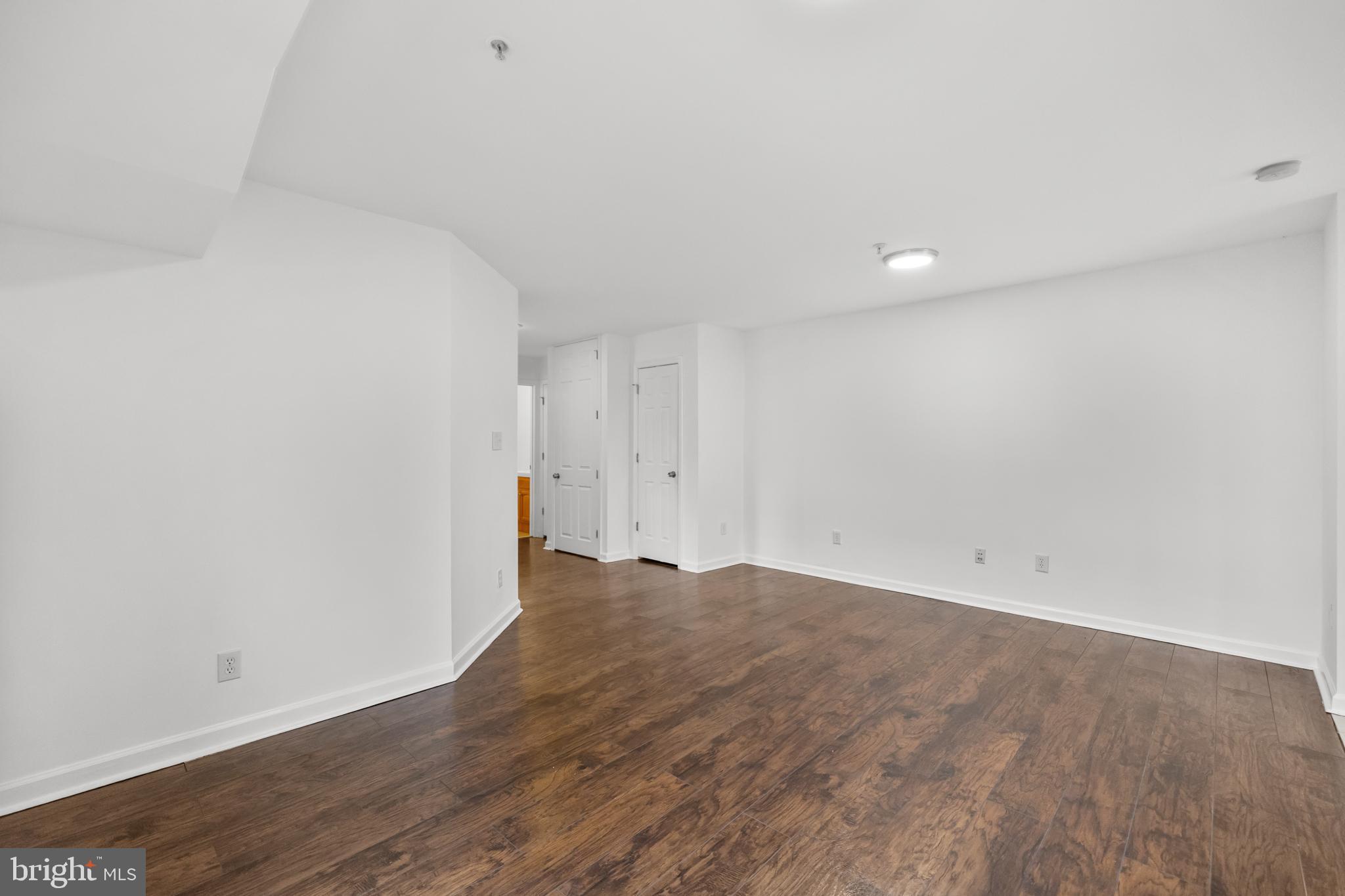 1386 Bryant Street Northeast, Unit 103 Washington, DC 20018 - Photo 11 of 28 a view of an empty room