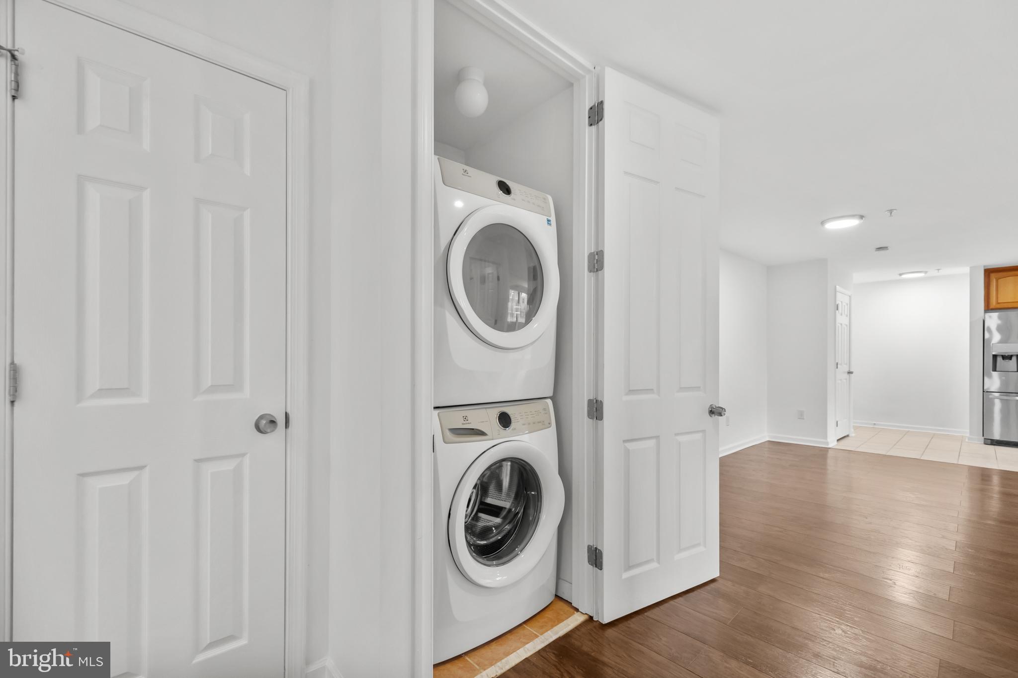 1386 Bryant Street Northeast, Unit 103 Washington, DC 20018 - Photo 16 of 28 a view of washer and dryer in a utility room