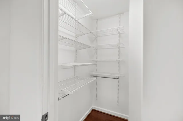 a view of an empty walk in closet