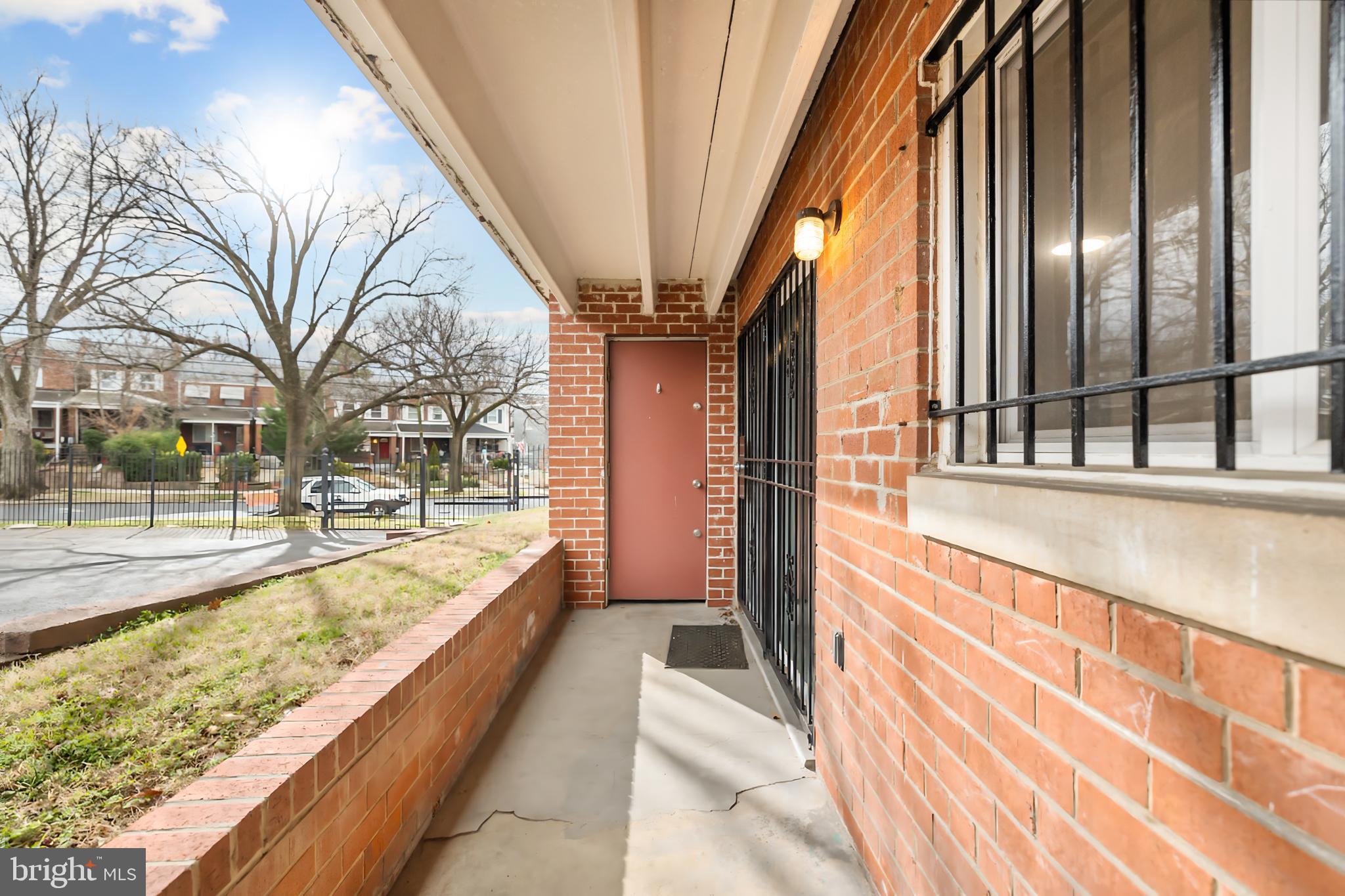 1386 Bryant Street Northeast, Unit 103 Washington, DC 20018 - Photo 23 of 28 a view of swimming pool with outdoor seating