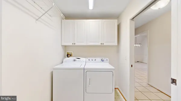 a view of empty room with wooden ceiling