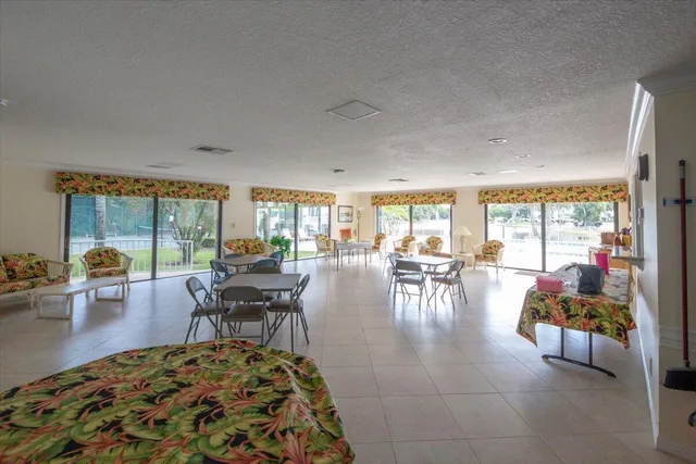 a view of a swimming pool with a patio