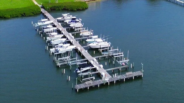 an aerial view of a house with a lake view