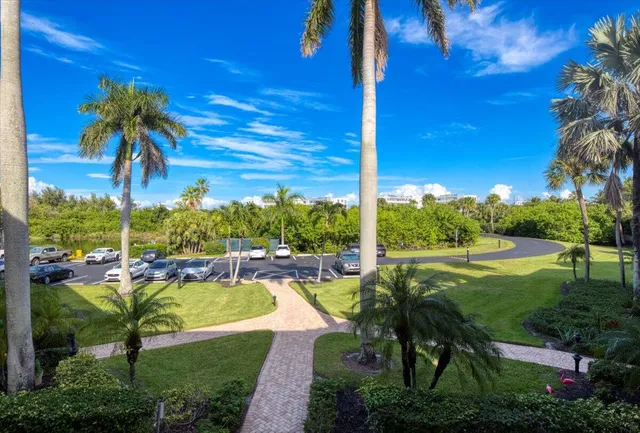 an aerial view of a house with a lake view